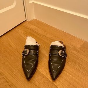 GIVENCHY
Leather Studded Accents Mules
